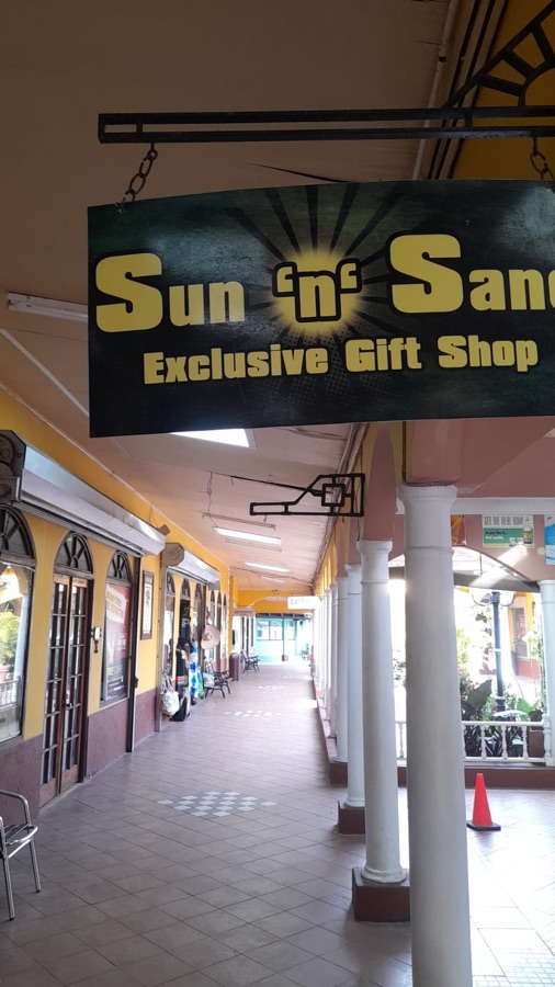 Sun 'n' Sand storefront sign at Time Square Shopping Mall, Negril